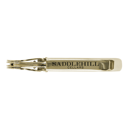 Gold wine key with Saddlehll Cellars name